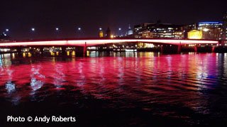 London Bridge lit up in red